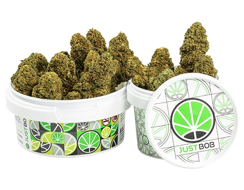 tin-with-flowers-of-GG#4-cbd-boost-cannabis