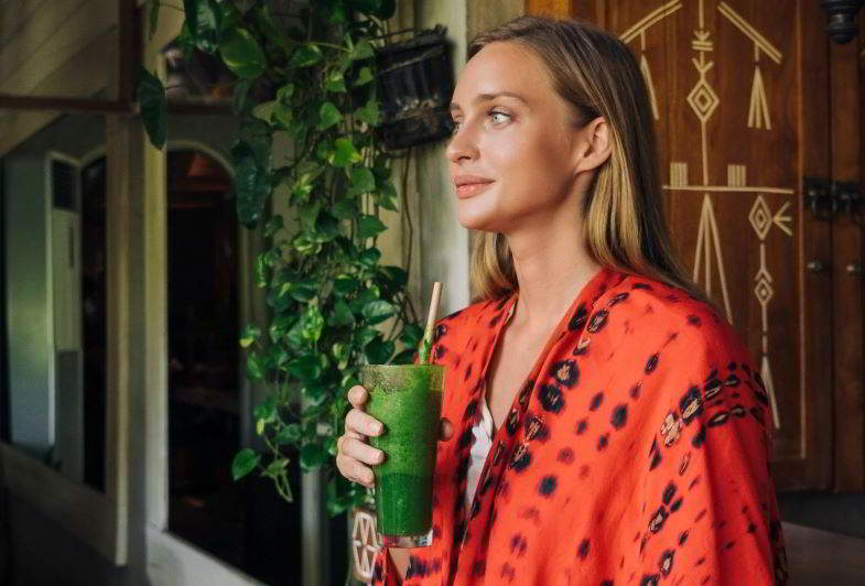 woman drinking a hemp protein shake