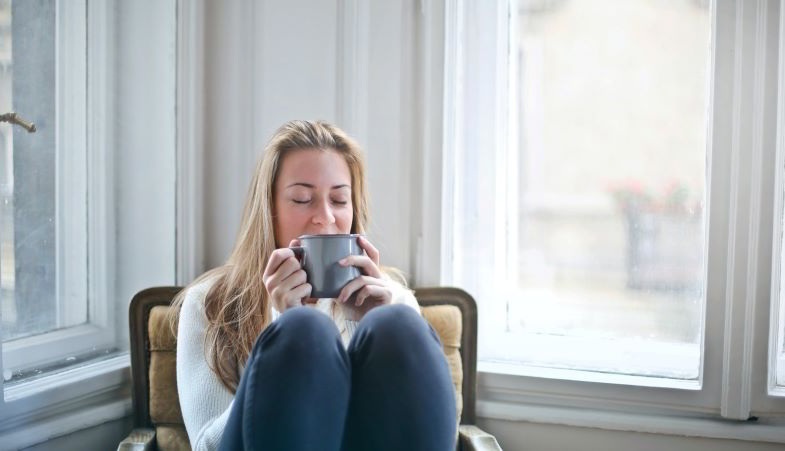 Girl drinking a natural herbal tea for anxiety