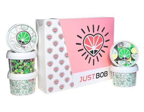 Valentine's Day kit with pink JustBob box and decorated light cannabis jars.