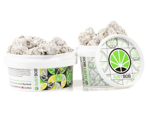 tin with flowers of og super boost cbd cannabis