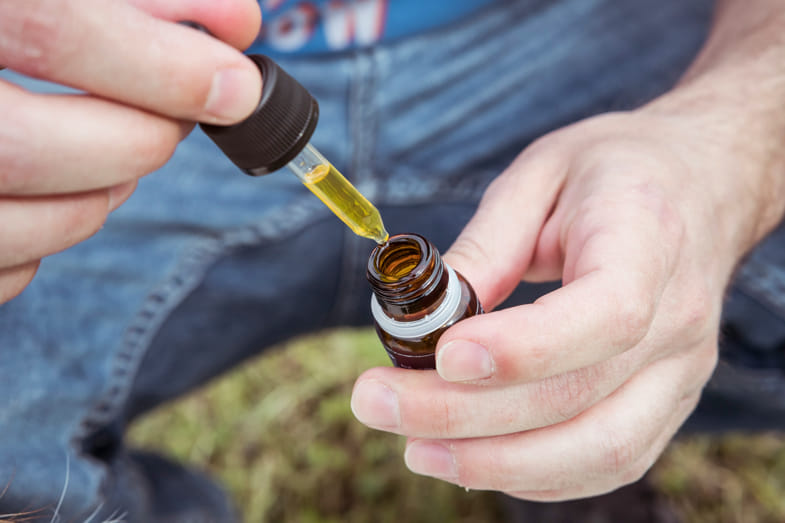 Vial of CBD oil | Justbob