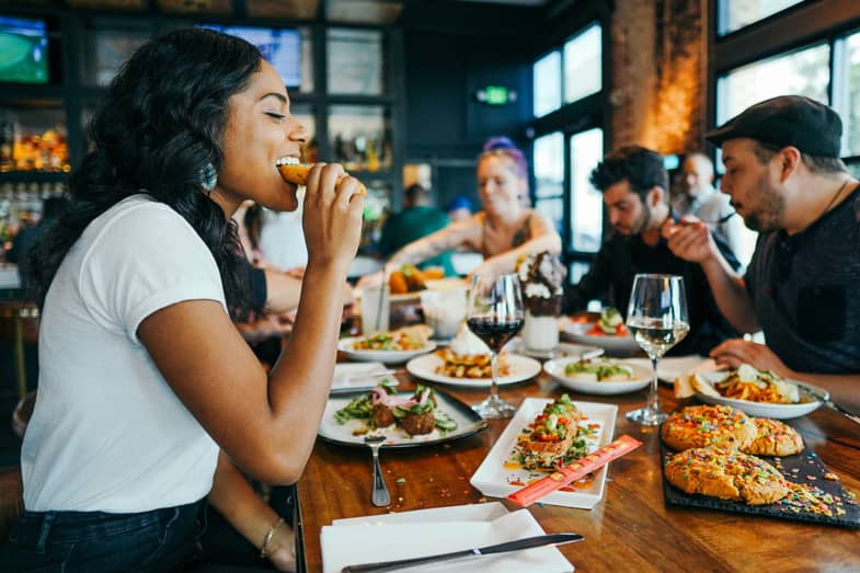 Girl eating a burger | Justbob