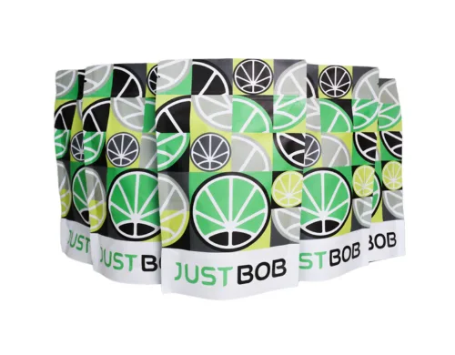 Packages with green JustBob logo for CBD flowers and CBD weed