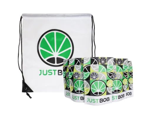 White backpack with green JustBob logo and packages for CBD flowers and CBD weed