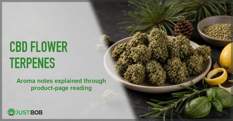 Justbob featured banner for CBD Flower Terpenes: hemp flower bowl with lemon peel, pinecones, rosemary, basil and peppercorn on dark slate