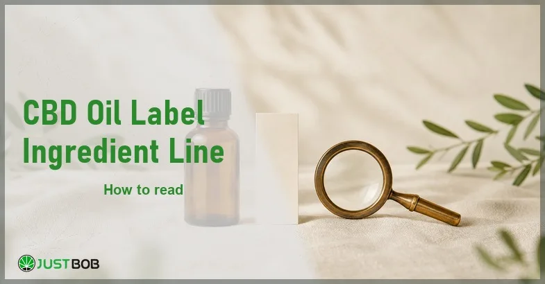 cbd-oil-label-ingredient-line Justbob CBD Oil Label Ingredient Line banner with green title, a CBD oil bottle, a blank label strip and a brass loupe on cream linen