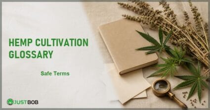 Justbob Hemp Cultivation Glossary banner with green title, field notebook, hemp stalks and brass loupe